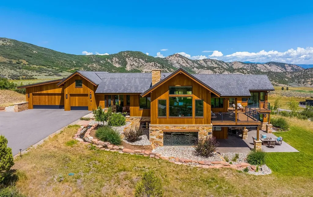 2445 Frost Creek Drive Home in Eagle, Colorado. Discover the epitome of elegant mountain living in this custom-designed Frost Creek home. Perched on the highest point, this exquisite residence offers 360-degree views of the private Club of Frost Creek and Brush Creek Valley.