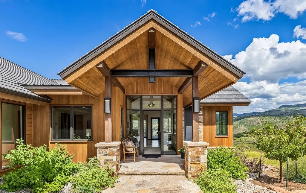 2445 Frost Creek Drive Home in Eagle, Colorado. Discover the epitome of elegant mountain living in this custom-designed Frost Creek home. Perched on the highest point, this exquisite residence offers 360-degree views of the private Club of Frost Creek and Brush Creek Valley.