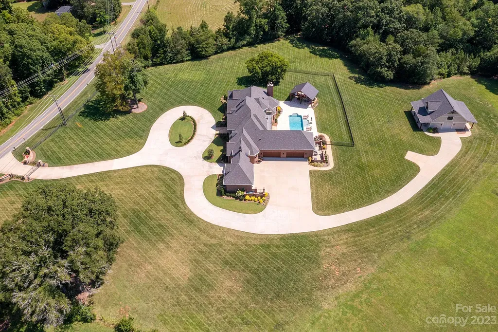 3200 Beaty Road Home in Gastonia, North Carolina. Experience unparalleled luxury living at 3200 Beaty Road, Gaston County's crown jewel. Set on 55 acres of North Carolina's stunning landscape, this estate offers ready-to-go fields, scenic trails, and a paradise for equine and ATV enthusiasts.