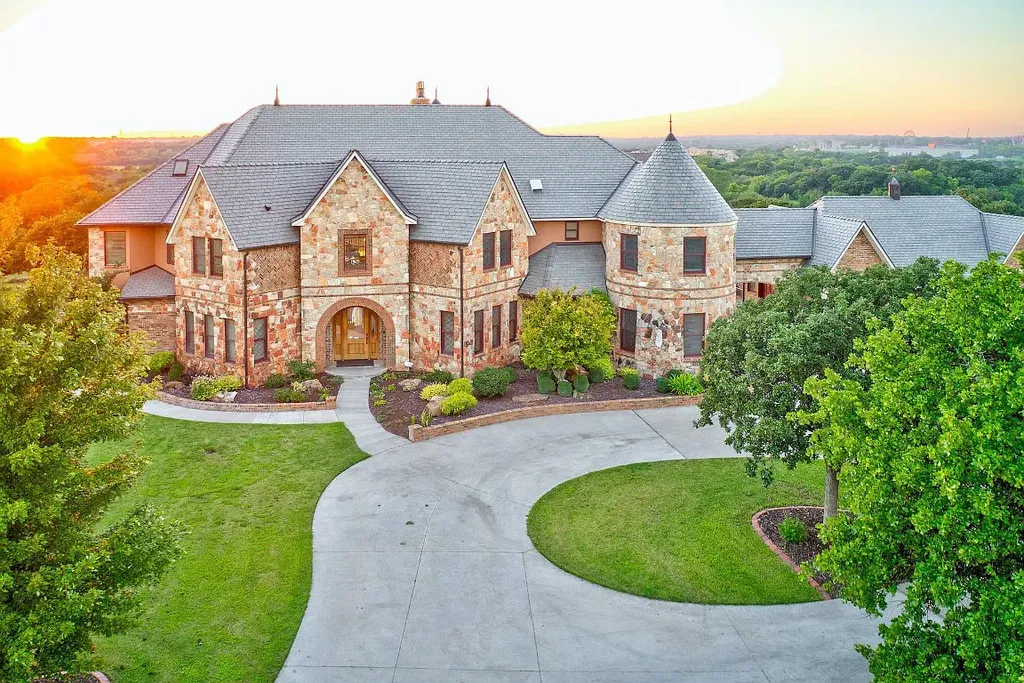 5001 Carrington Place Home in Oklahoma City, Oklahoma. Prepare to be entranced by the awe-inspiring surroundings of this exceptional estate, a harmonious blend of functionality, design, and unparalleled craftsmanship. From the moment you step inside, you'll be greeted by the elegance of quarter-sawn white oak doors, floors, and trim that evoke a sense of refined luxury.