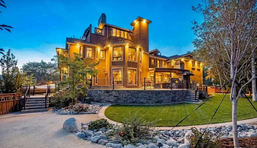 515 Rhodes Road Home in Reno, Nevada. Welcome to the grounds of a truly remarkable "Exquisite Executive Retreat," nestled on a private and secure 5-acre estate. Boasting 5 bedrooms and 6.5 bathrooms, this home is a testament to elegance, offering optimal living spaces from meadows to mountain views. 