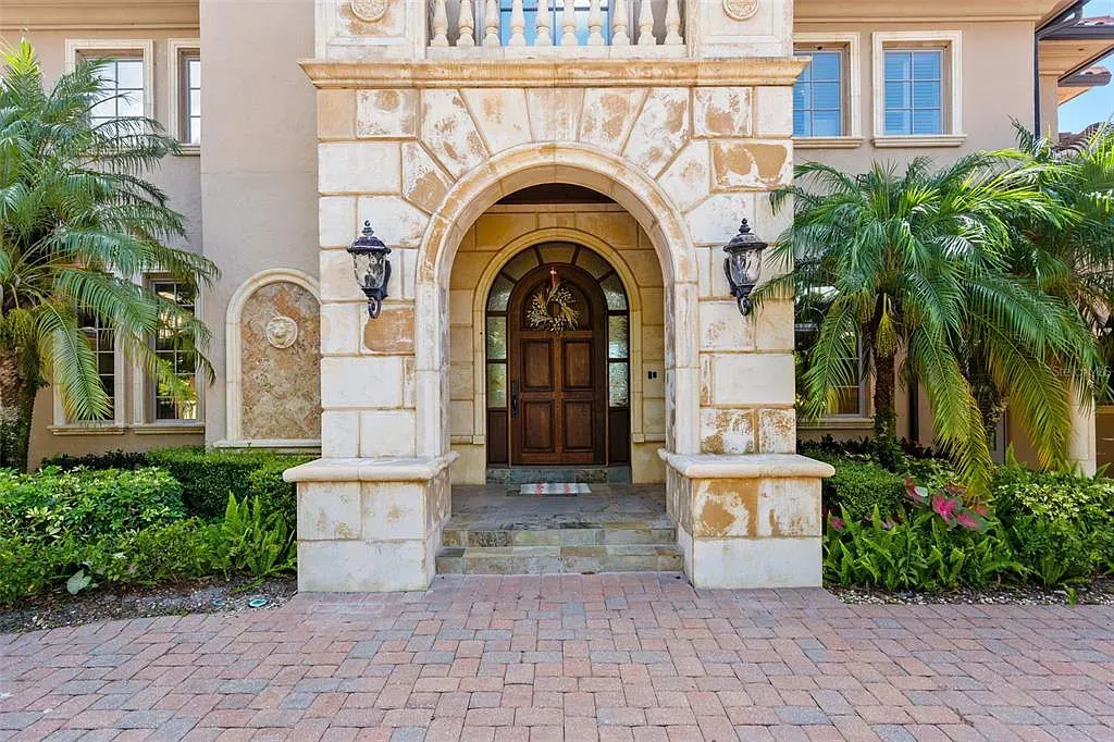 6120 Kirkstone Lane Home in Windermere, Florida. Welcome to a captivating lakefront estate that embodies luxury living at its finest. This exquisite custom-built home boasts unparalleled beauty and sophistication with meticulous attention to detail and premium materials.