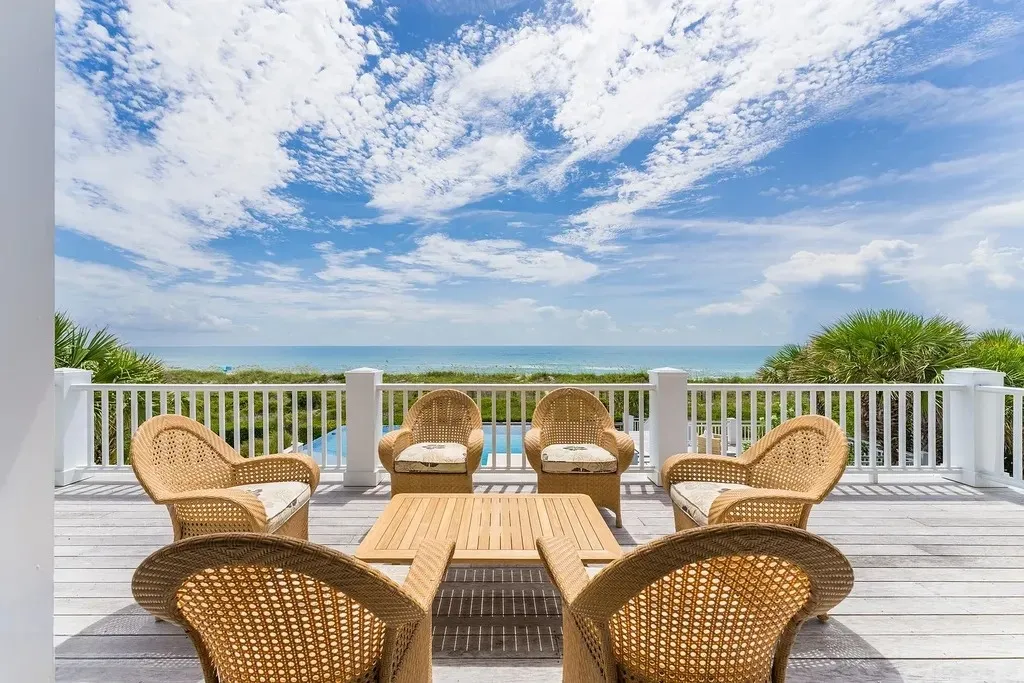 7 Cowrie Lane Home in Wrightsville Beach, North Carolina. Discover the epitome of luxurious coastal living at this expansive oceanfront estate in Wrightsville Beach. Set on nearly one acre of pristine land, this majestic property features a resort-style pool, lush landscaping, and private beach access. 