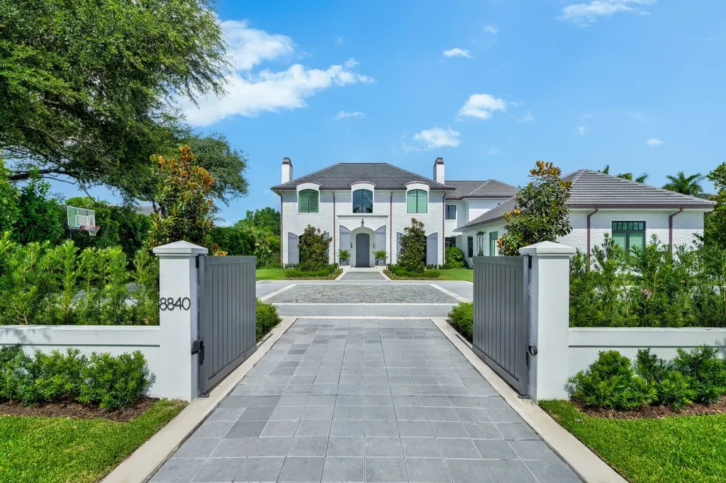 8840 SW 61st Court Home in Pinecrest, Florida. Explore this exquisite European-inspired home in N. Pinecrest, boasting 7 bedrooms and 7.5 bathrooms. From the formal living room with a wine cellar to the showstopper kitchen, this residence exudes elegance and sophistication.