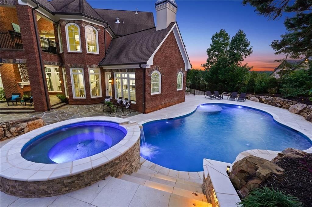 Majestic Estate: Highlighting a Resort-Style Pool and Outdoor Living Space Offered at $3.299 Million in Milton, Georgia