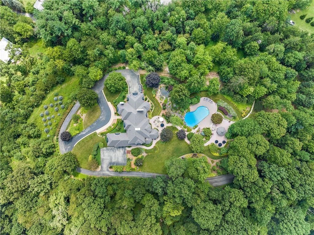 Unparalleled Tranquility: Secluded Estate with Luxurious Features on 20 Acres in Indiana, Pennsylvania Priced at $3 Million