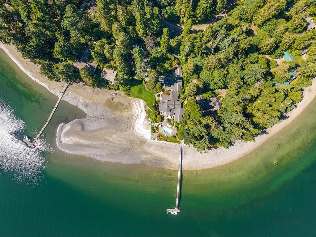 Washington's Coastal Gem: Architectural Masterpiece on White Sand along Manzanita Bay Shoreline, Listed at $7.8 Million