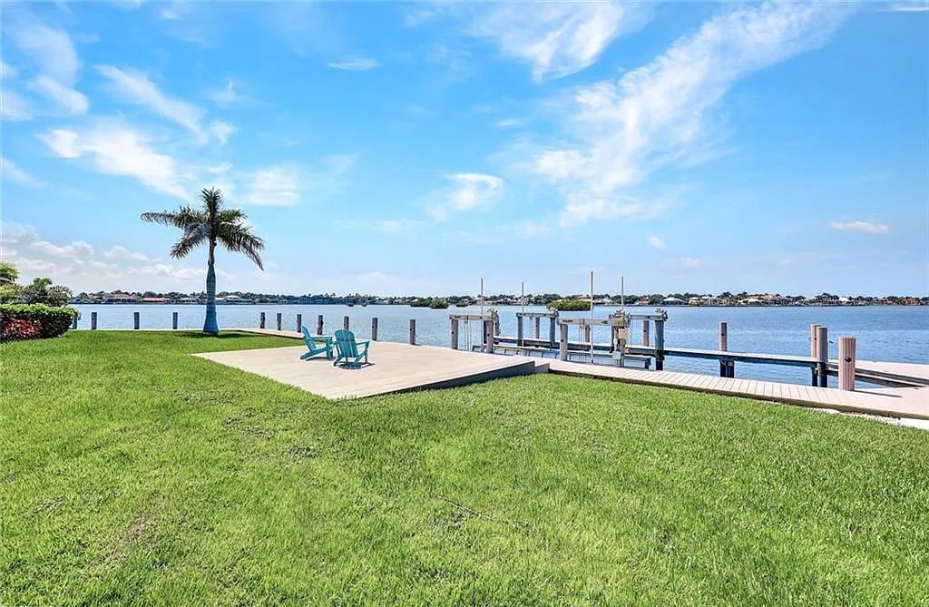 Nestled on a rare .78-acre tip-lot with 356 feet of seawall, Villa Italia at 550 Alameda Court, Marco Island, Florida, is a waterfront masterpiece. This opulent estate, built in 1977, spans 9,874 square feet and offers six ensuite bedrooms, a separate guest house, and a host of luxurious amenities, including a wine cellar, home theater, and game room.