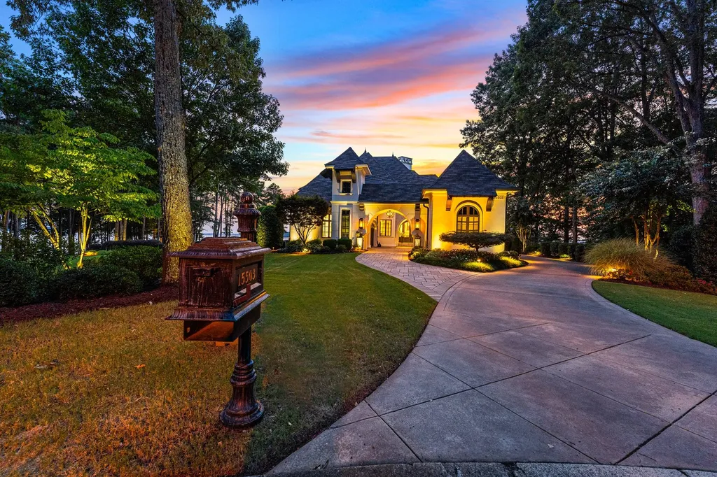 15503 Fishermans Rest Court Home in Cornelius, North Carolina. Experience timeless luxury in this private custom home within The Peninsula, offering breathtaking panoramic views of Lake Norman. Meticulously renovated to perfection, it features a gourmet chef’s kitchen, spacious living areas, a serene pool deck, and endless amenities. Enjoy exquisite sunrises and sunsets in this exceptional lakefront estate.