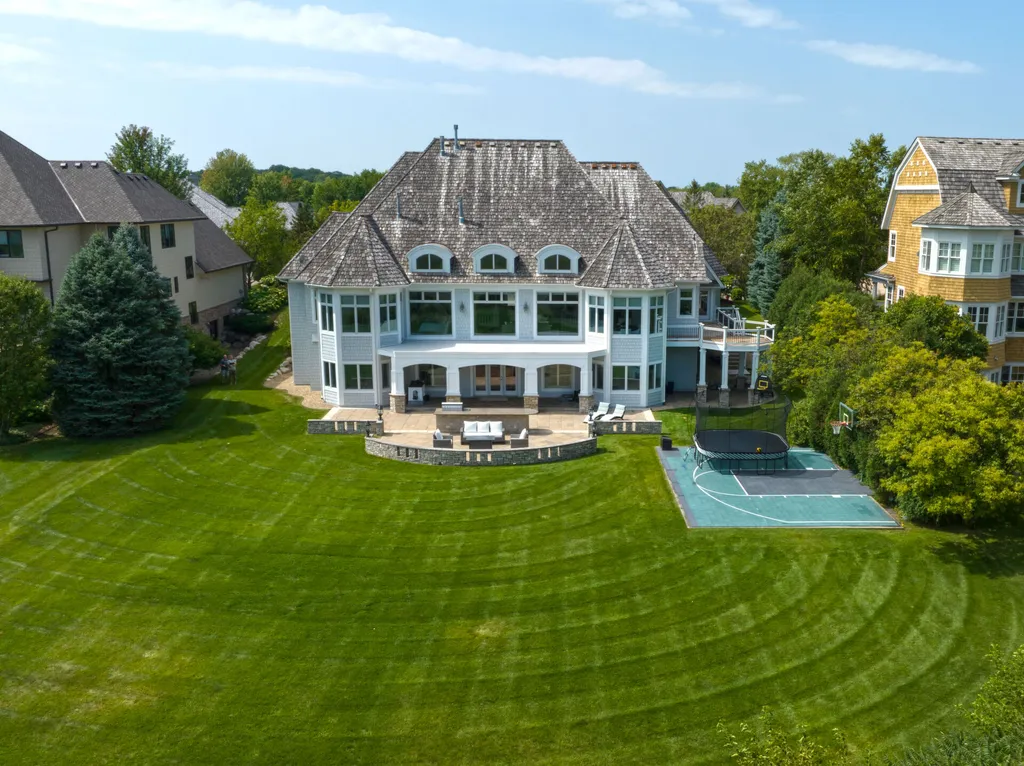 18355 Nicklaus Way Home in Eden Prairie, Minnesota. Prepare to be mesmerized by the sheer beauty and sophistication of this truly exceptional residence, considered one of the finest properties in Bearpath. Nestled on one of three original founder lots, this home was destined to become the crown jewel of this prestigious community.