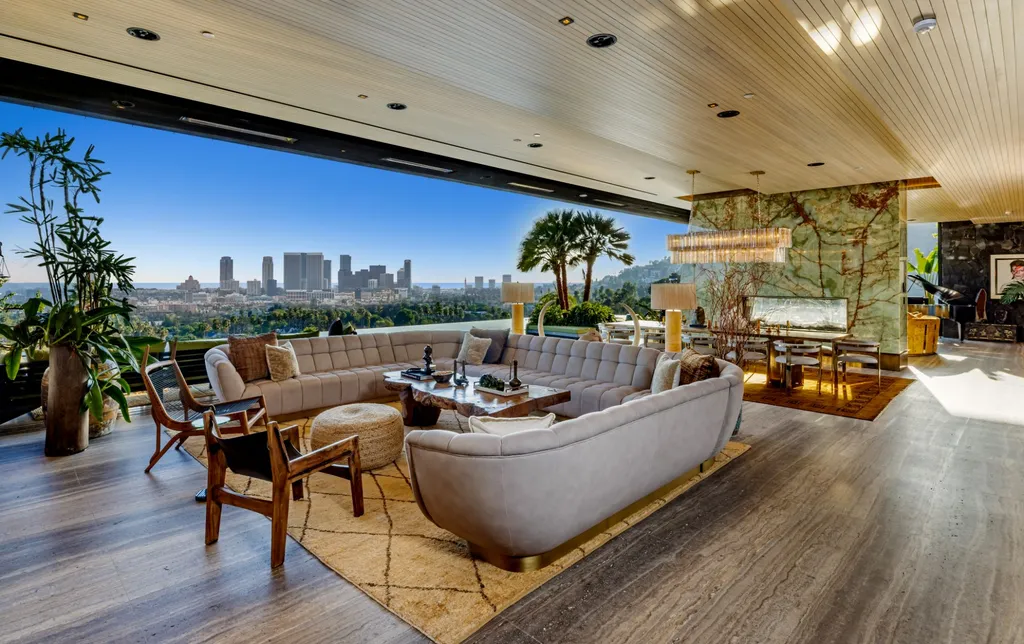 1851 North Stanley Avenue Home in Los Angeles, California. Step into the world of legends at the Californication House, a mid-century modern paradise perched above the Sunset Strip. This architectural gem boasts 270-degree views, unmatched privacy, and the finest craftsmanship. 