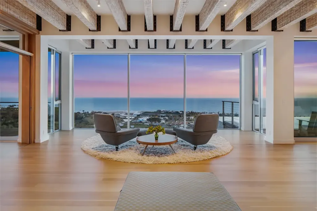 23800 Malibu Crest Drive Home in Malibu, California. Experience the pinnacle of coastal living in this new construction estate on a 3.4-acre promontory in Malibu. With breathtaking ocean, mountain, and canyon views, this 16,500-SF compound features a main house and guest house with luxurious amenities, including a Bulthaup chef's kitchen, infinity pool, and spa. 