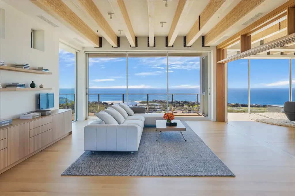 23800 Malibu Crest Drive Home in Malibu, California. Experience the pinnacle of coastal living in this new construction estate on a 3.4-acre promontory in Malibu. With breathtaking ocean, mountain, and canyon views, this 16,500-SF compound features a main house and guest house with luxurious amenities, including a Bulthaup chef's kitchen, infinity pool, and spa. 