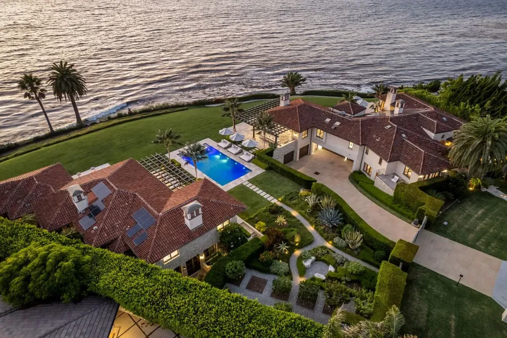 245 Rocky Point Road Home in Palos Verdes Estates, California. Nestled on the western-most point of Palos Verdes Estates, this expansive 1.15-acre compound offers unparalleled luxury and seclusion with 180-degree views of the California coastline. Designed by renowned interior designer Tim Clarke, this coastal masterpiece seamlessly blends stone and plaster with the natural surroundings.