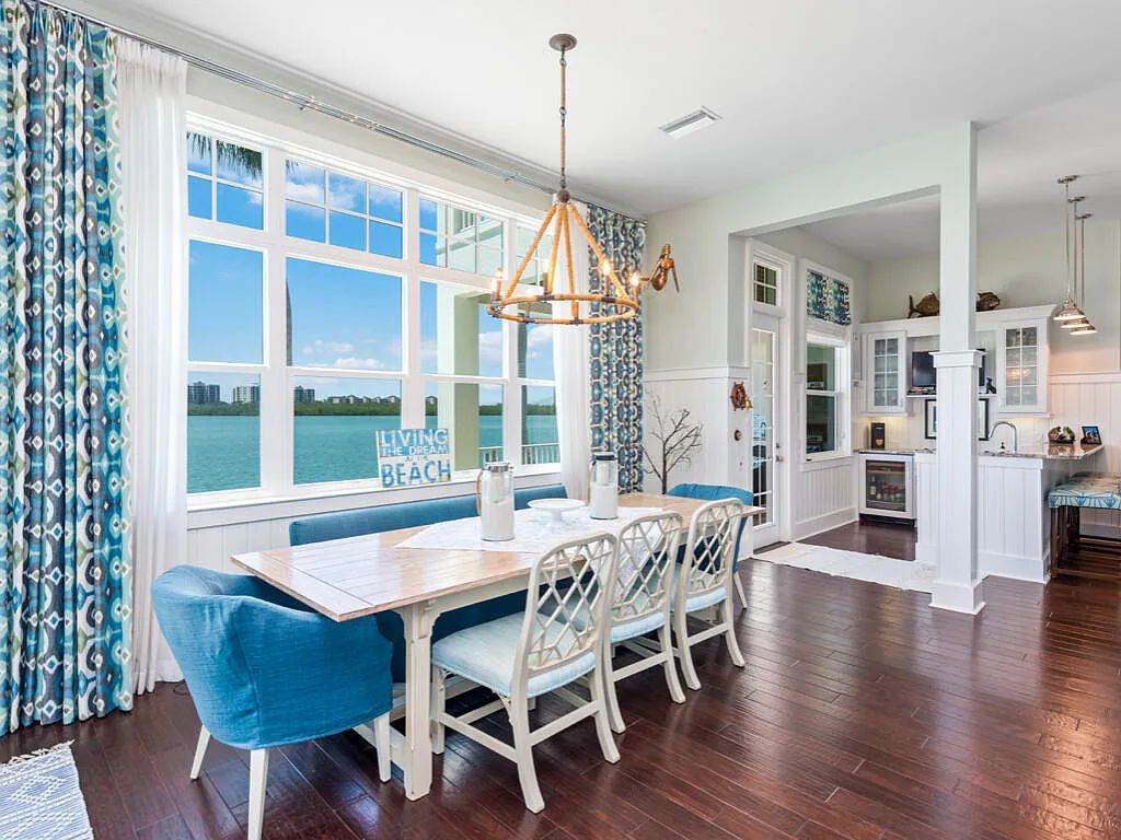 Nestled in prestigious Collier Bay on Marco Island, 960 Giralda Ct embodies coastal luxury living at its finest. With unobstructed bay views, this 2014-built, 4-bedroom, 5-bathroom home seamlessly combines opulence and coastal chic style.