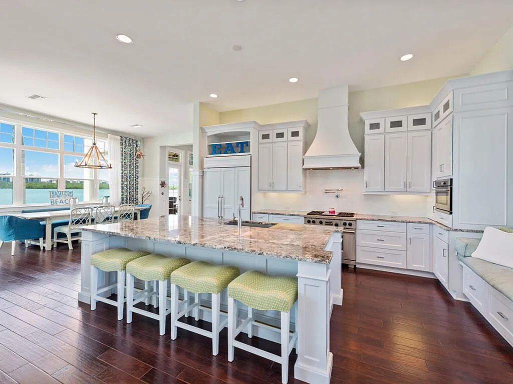 Nestled in prestigious Collier Bay on Marco Island, 960 Giralda Ct embodies coastal luxury living at its finest. With unobstructed bay views, this 2014-built, 4-bedroom, 5-bathroom home seamlessly combines opulence and coastal chic style.