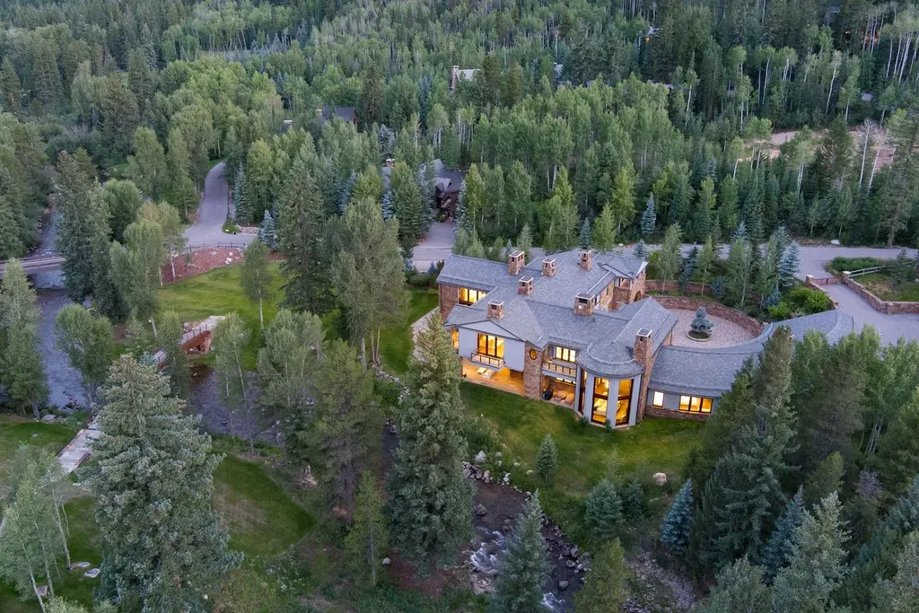 41 Popcorn Lane Home in Aspen, Colorado. Discover a truly remarkable property nestled in the heart of Aspen, where the Roaring Fork River flows just steps from your door. This unique estate, comprised of 41 Popcorn Lane and 100 Difficult Lane, offers an unbeatable combination of location, luxurious living, and stunning natural beauty.