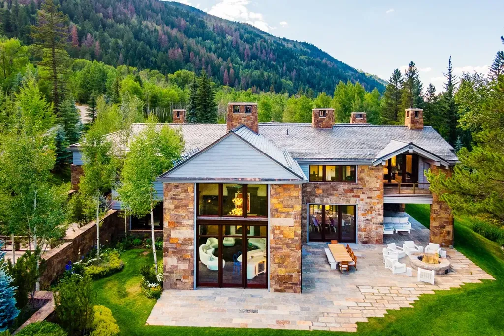 41 Popcorn Lane Home in Aspen, Colorado. Discover a truly remarkable property nestled in the heart of Aspen, where the Roaring Fork River flows just steps from your door. This unique estate, comprised of 41 Popcorn Lane and 100 Difficult Lane, offers an unbeatable combination of location, luxurious living, and stunning natural beauty.