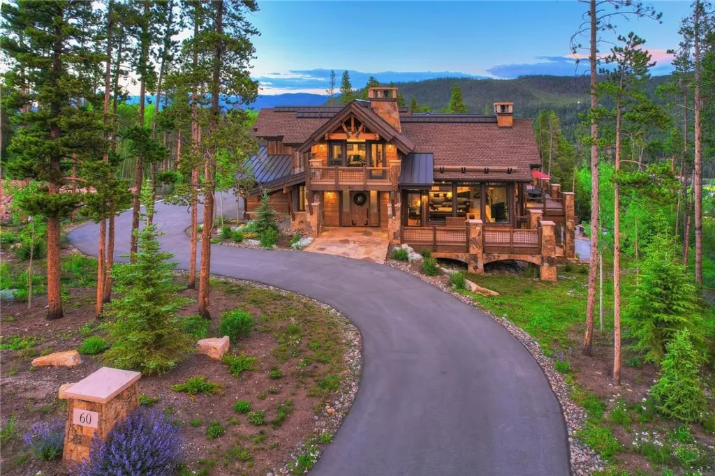 60 Iron Mask Road Home in Breckenridge, Colorado. Experience the pinnacle of mountain luxury living in this stunning Breckenridge property. Enjoy private gondola access, breathtaking ski slope views, expansive decks, and an array of in-house amenities, including a jacuzzi, sauna, and wine cellar. Whether you're seeking adventure or relaxation, this multi-family retreat offers the perfect escape in the heart of the Rockies.