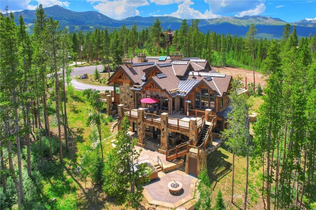60 Iron Mask Road Home in Breckenridge, Colorado. Experience the pinnacle of mountain luxury living in this stunning Breckenridge property. Enjoy private gondola access, breathtaking ski slope views, expansive decks, and an array of in-house amenities, including a jacuzzi, sauna, and wine cellar. Whether you're seeking adventure or relaxation, this multi-family retreat offers the perfect escape in the heart of the Rockies.