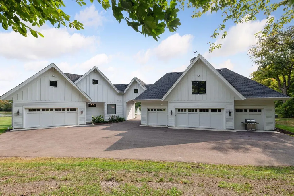 6980 Laketown Parkway Home in Waconia, Minnesota. Welcome to Maple Ridge Farm, a hidden gem at the end of a private driveway on nearly 30 acres of breathtaking natural beauty. This custom-built 5-bedroom, 5-bathroom rambler, completed in 2017 by Lecy Bros, offers a lifestyle like no other.