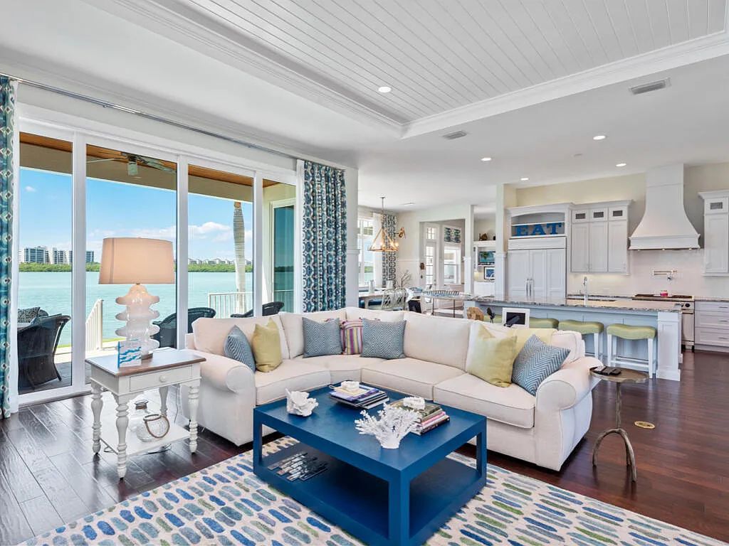 Nestled in prestigious Collier Bay on Marco Island, 960 Giralda Ct embodies coastal luxury living at its finest. With unobstructed bay views, this 2014-built, 4-bedroom, 5-bathroom home seamlessly combines opulence and coastal chic style.