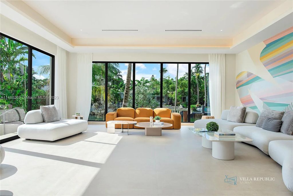 Welcome to the epitome of luxury living in this new 7-bedroom, 7-bathroom estate at 1200 NE 87th St, Miami, Florida, completed in 2023. Designed with the utmost sophistication, it offers spacious living areas, a connected guest house, and top-notch amenities.