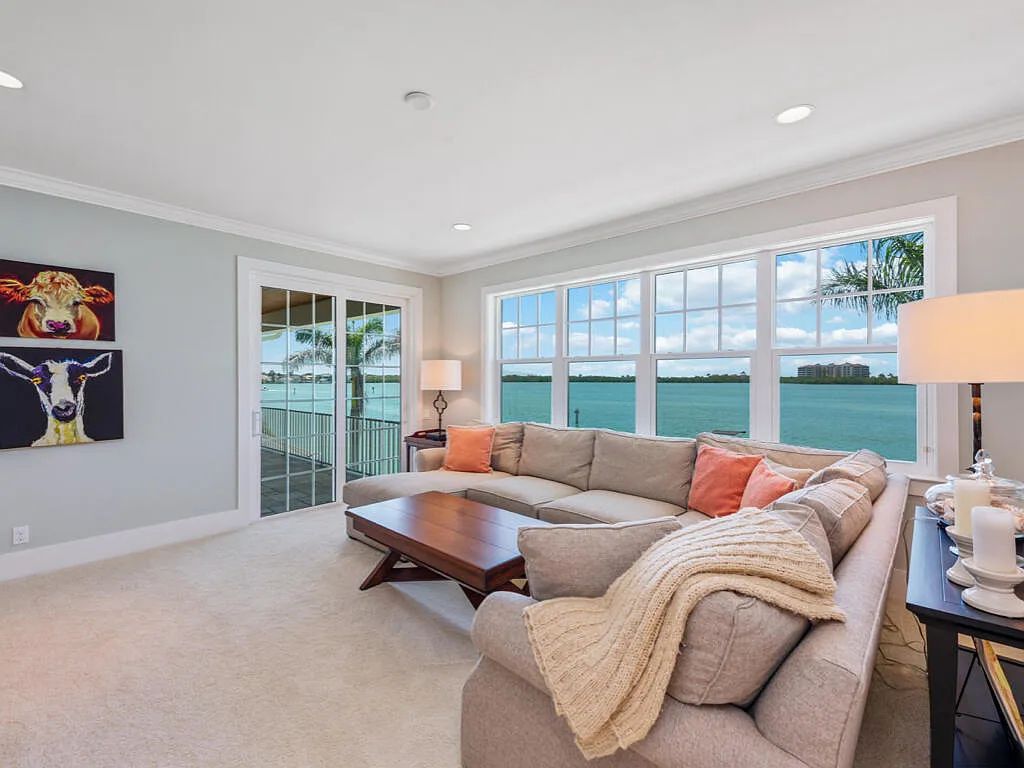 Nestled in prestigious Collier Bay on Marco Island, 960 Giralda Ct embodies coastal luxury living at its finest. With unobstructed bay views, this 2014-built, 4-bedroom, 5-bathroom home seamlessly combines opulence and coastal chic style.