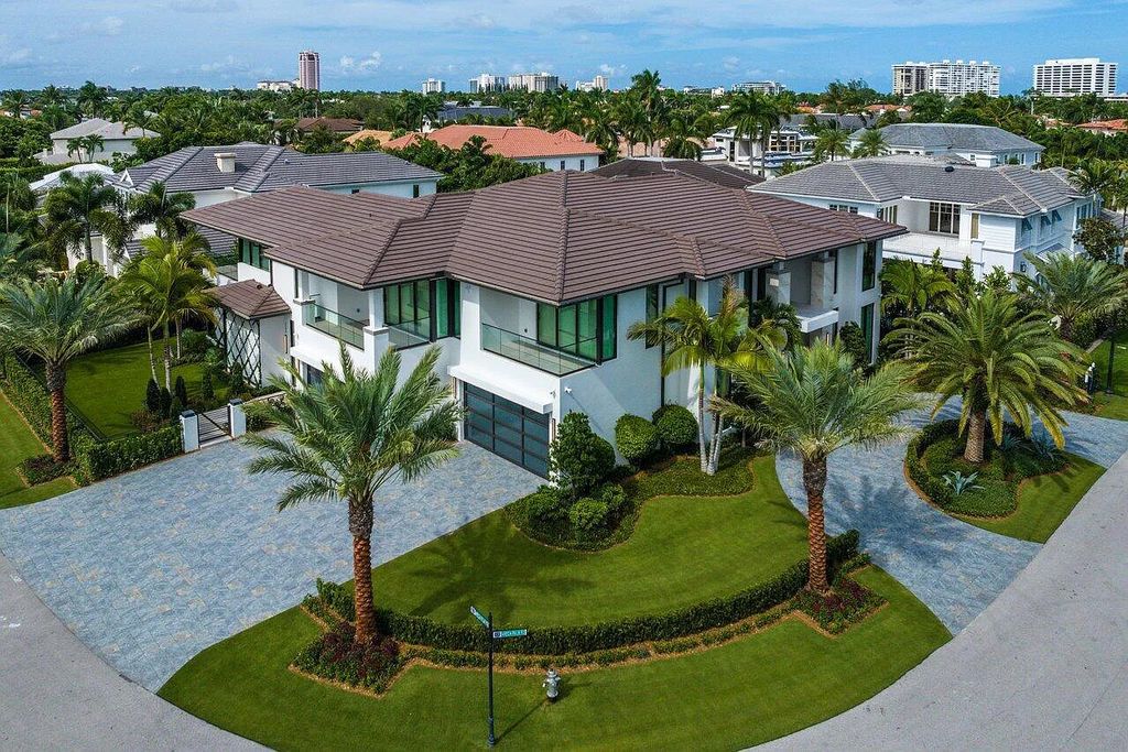 Introducing a stunning new listing in Boca Raton, Florida, located at 2398 Areca Palm Road. This magnificent custom-built estate boasts 6 bedrooms and 9 bathrooms within its spacious 7,523 square feet of living space. Situated on an expansive lot of 0.36 acres in the prestigious Royal Palm Yacht & Country Club, this brand-new home offers luxurious amenities and impeccable design.
