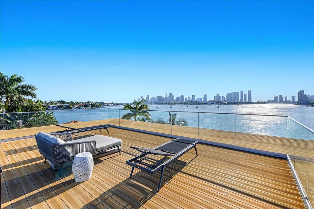 Experience the pinnacle of Miami Beach living at 40 W San Marino Drive. This striking modern waterfront estate by Cheoff Levy Fischman offers 5 bedrooms, 4 bathrooms, and 5,020 square feet of luxury living space built in 2020.