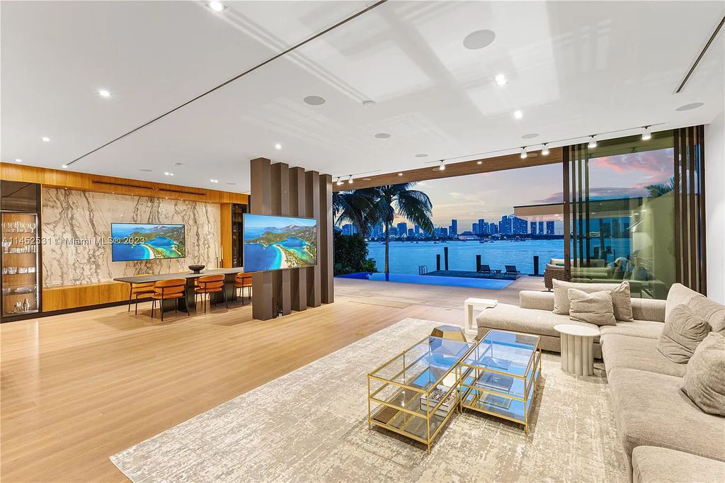 Experience the pinnacle of Miami Beach living at 40 W San Marino Drive. This striking modern waterfront estate by Cheoff Levy Fischman offers 5 bedrooms, 4 bathrooms, and 5,020 square feet of luxury living space built in 2020.