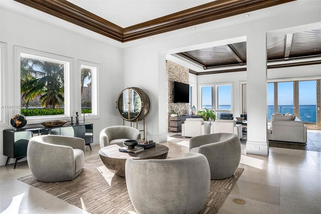 Discover the epitome of luxury waterfront living at 3590 Crystal View Court, Miami, Florida. This magnificent mansion offers 6 bedrooms, 10 bathrooms, and 13,930 square feet of living space on a spacious 0.45-acre lot.