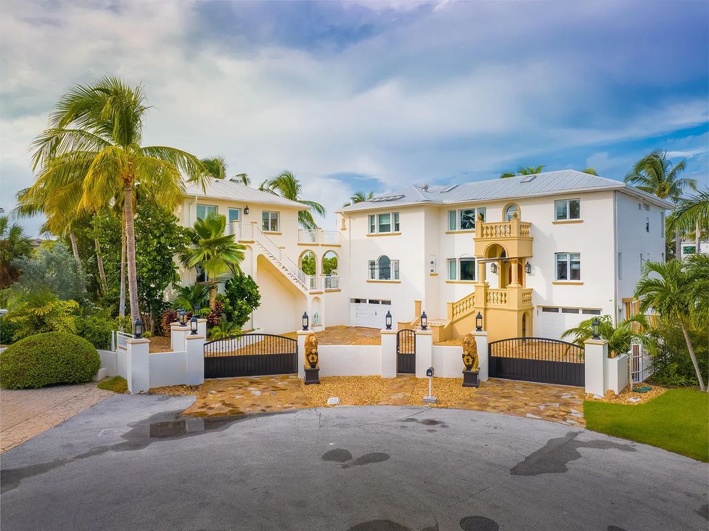 Nestled in Key West, Florida, 39 Evergreen Ave is a luxurious waterfront estate that defines opulence. Boasting 8 bedrooms and 8 bathrooms across a sprawling 6,611 square feet, this property includes a 5-bedroom main residence and a separate 3-bedroom guest house.