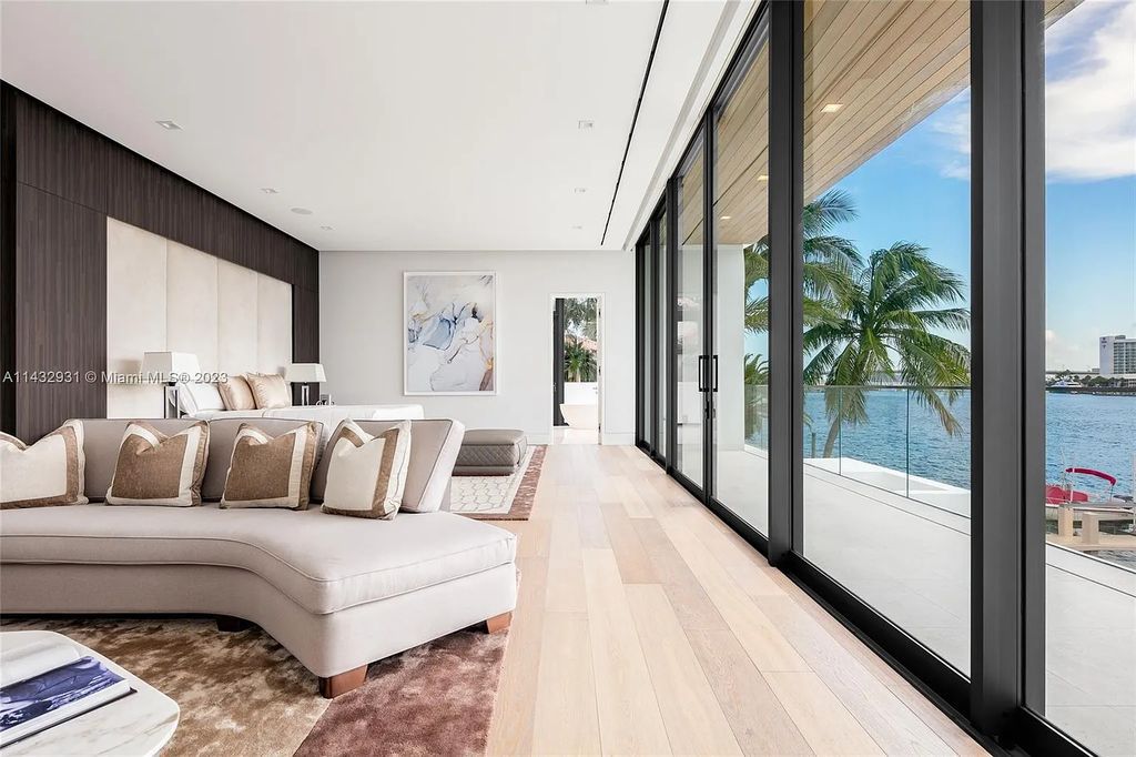 Luxury awaits in this 2021-built, 6-bed, 9-bath modern masterpiece in Fort Lauderdale's Harbor Beach gated community. Designed by Randall Stofft and crafted by Sarkela Corp, this 9,451 sq ft home features 120 ft of Intracoastal frontage, a lap pool, and outdoor kitchen.