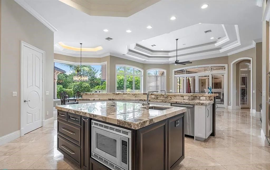 Gold Standard in Luxury & Privacy! Exceptional finishes, the finest craftsmanship, meticulous millwork & soaring vaulted groin coffered ceilings perfectly blend to create a sophisticated & special estate.