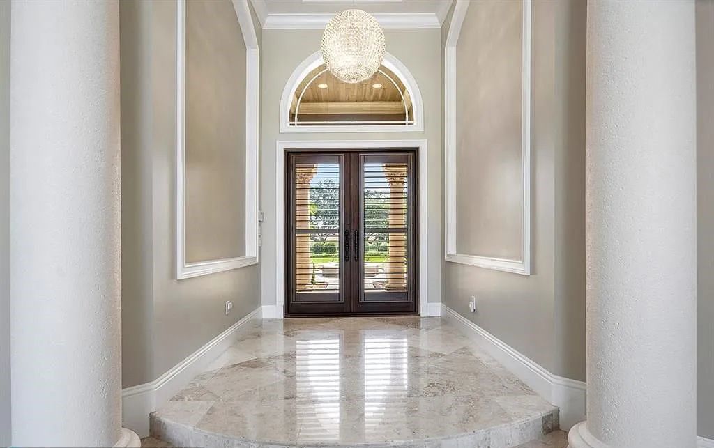 Gold Standard in Luxury & Privacy! Exceptional finishes, the finest craftsmanship, meticulous millwork & soaring vaulted groin coffered ceilings perfectly blend to create a sophisticated & special estate.