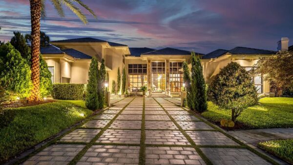 Extraordinary $8 Million Lakefront Estate: A Frank Lloyd Wright-Inspired Masterpiece in Boca Raton, FL