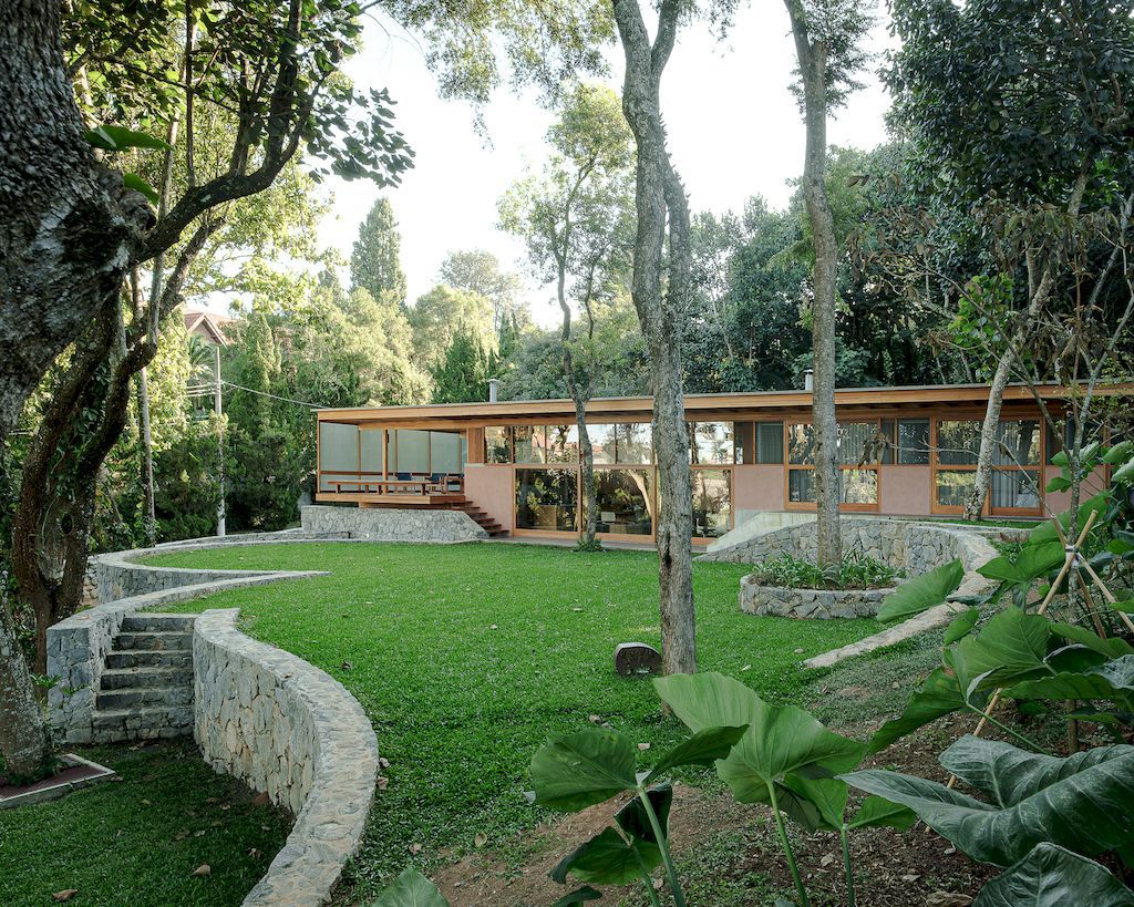 House of the Circular Terraces, nestled in tranquil valley by Denis Joelsons