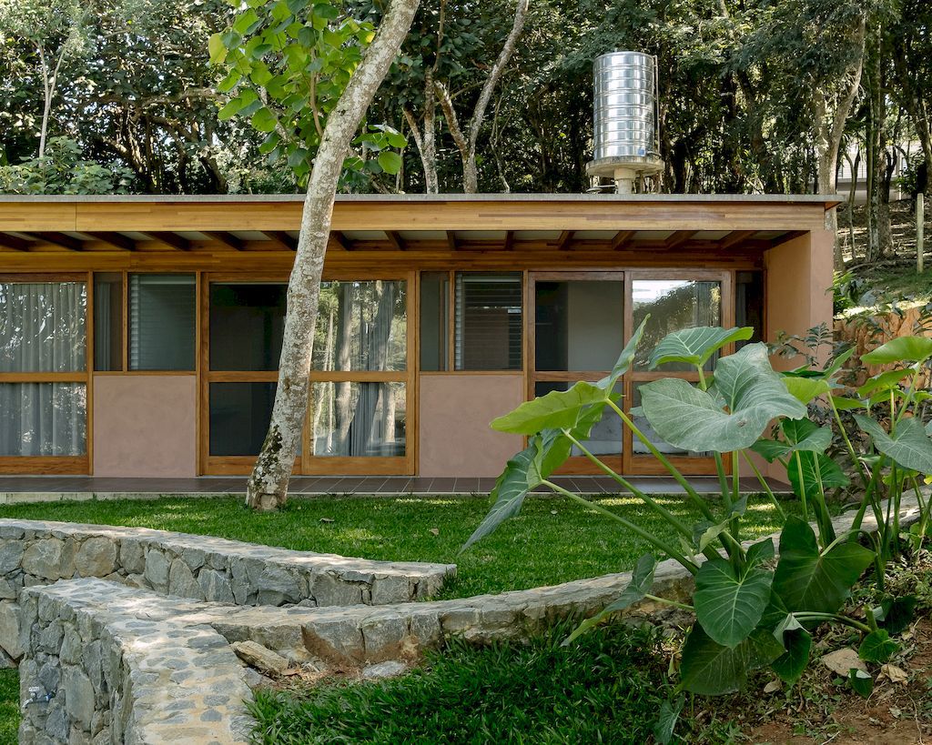 House of the Circular Terraces, nestled in tranquil valley by Denis Joelsons