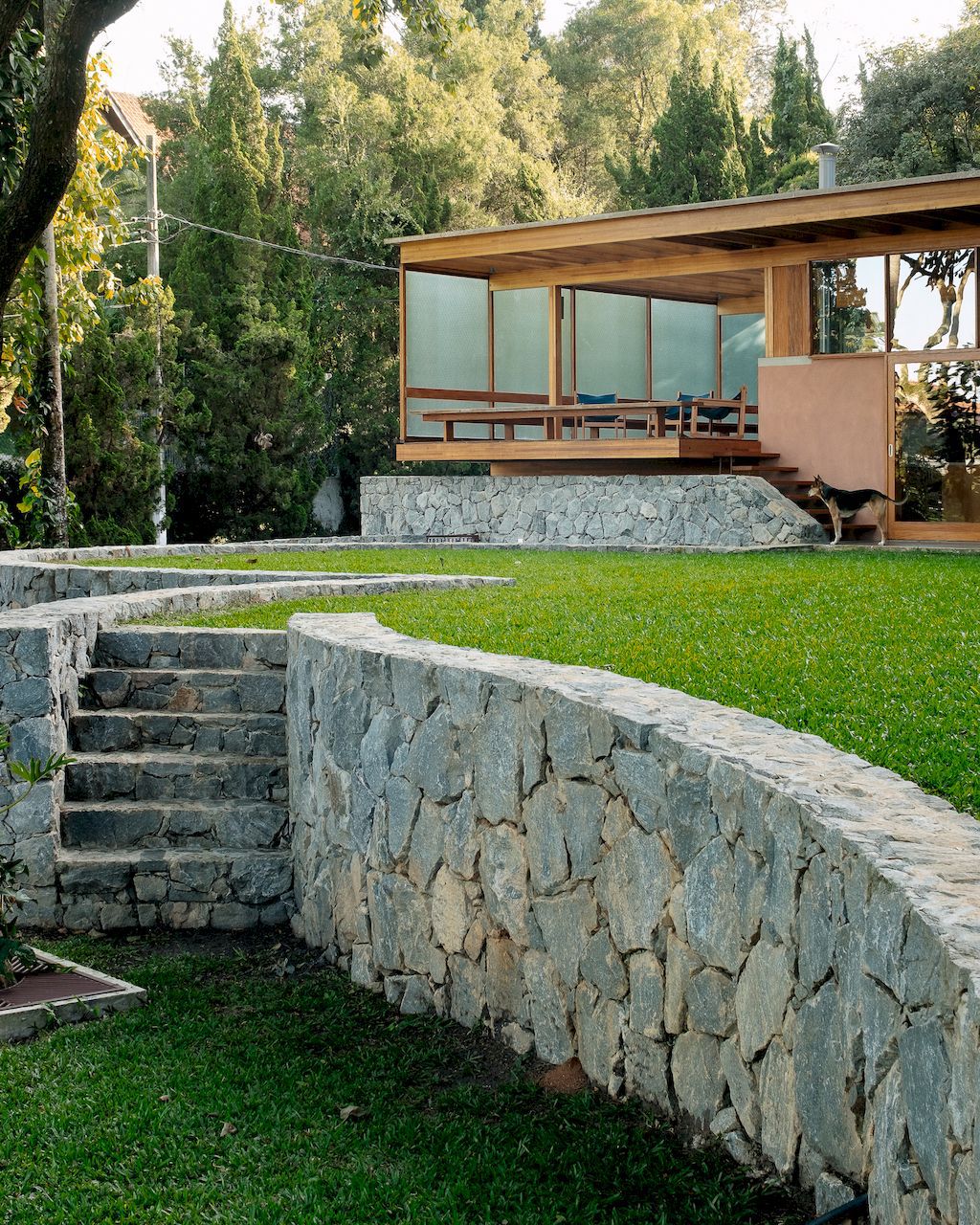 House of the Circular Terraces, nestled in tranquil valley by Denis Joelsons