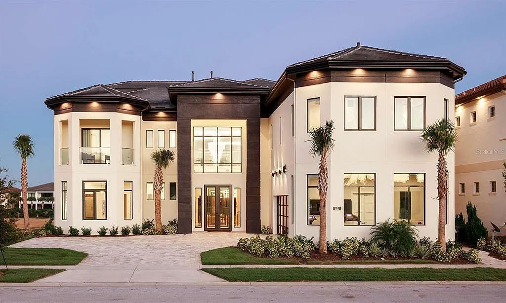 Discover 1121 Grand Traverse Pkwy, Kissimmee, Florida - an exquisite 9-bedroom, 12-bathroom estate nestled in the prestigious Estates neighborhood of Reunion Resort & Club. This 2018-built, 10,541-square-foot mansion is a high-performing short-term rental property, featuring a modern, elegant design with high-end fixtures and a state-of-the-art games room.