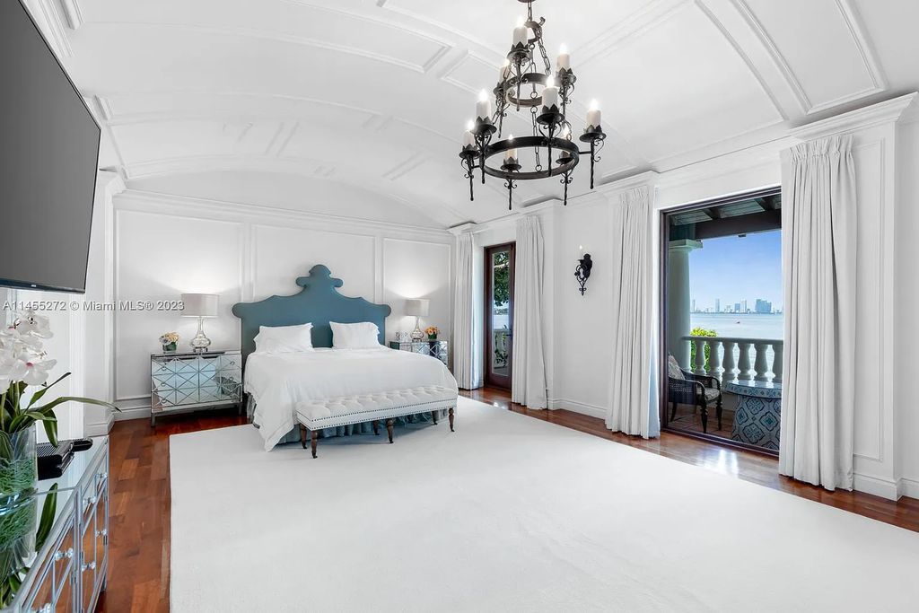 Escape to the lap of luxury in Miami Beach's Montecito neighborhood with this fully renovated 5-bed, 6-bath masterpiece boasting breathtaking downtown views. The 6,977-square-foot interior features vaulted ceilings, a gourmet kitchen, and en-suite bedrooms with walk-in closets.