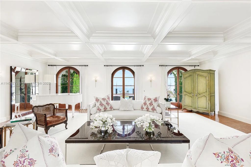 Escape to the lap of luxury in Miami Beach's Montecito neighborhood with this fully renovated 5-bed, 6-bath masterpiece boasting breathtaking downtown views. The 6,977-square-foot interior features vaulted ceilings, a gourmet kitchen, and en-suite bedrooms with walk-in closets.