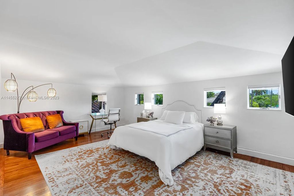 Escape to the lap of luxury in Miami Beach's Montecito neighborhood with this fully renovated 5-bed, 6-bath masterpiece boasting breathtaking downtown views. The 6,977-square-foot interior features vaulted ceilings, a gourmet kitchen, and en-suite bedrooms with walk-in closets.