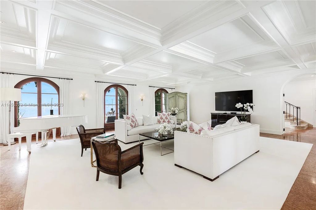 Escape to the lap of luxury in Miami Beach's Montecito neighborhood with this fully renovated 5-bed, 6-bath masterpiece boasting breathtaking downtown views. The 6,977-square-foot interior features vaulted ceilings, a gourmet kitchen, and en-suite bedrooms with walk-in closets.