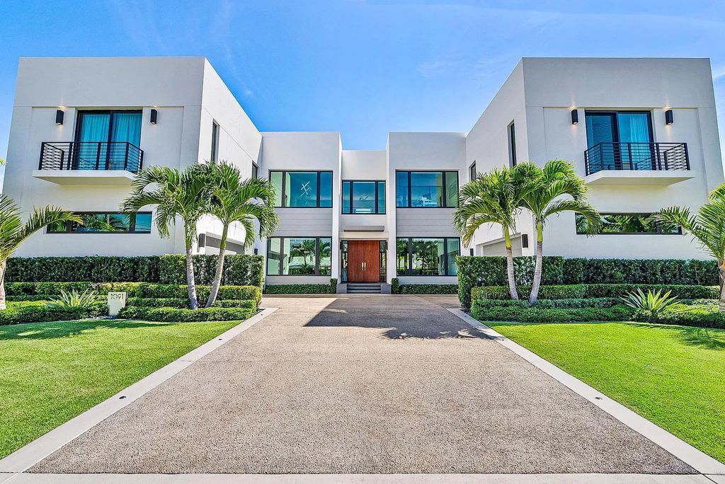 Nestled in the prestigious Riviera Beach, Florida, 1091 Gulfstream Way offers a cutting-edge waterfront lifestyle. This modern masterpiece boasts 5 bedrooms, 2 offices, a spacious gym, and a media room, providing ample space for work and leisure. Its gourmet kitchen with Liebherr appliances and a saltwater pool adds to the luxurious living.