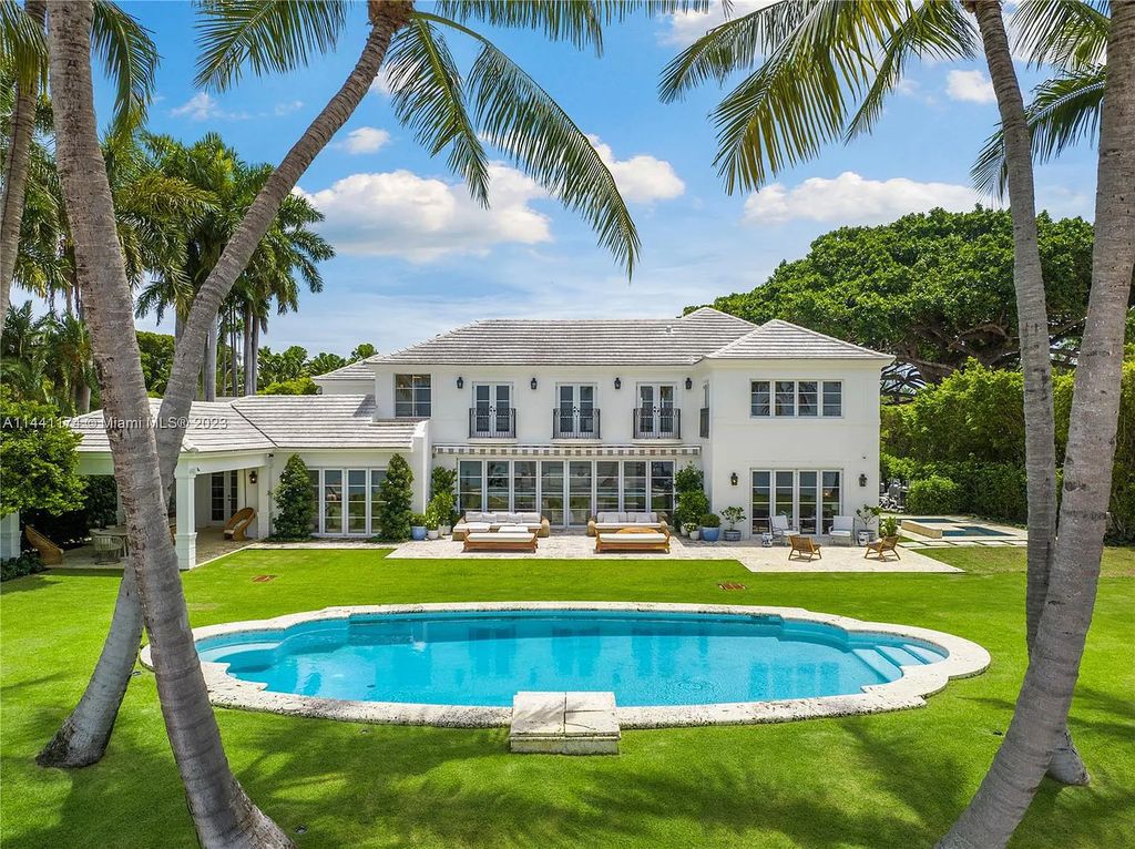 Nestled on prestigious North Bay Rd, this fully renovated 8-bed, 10-bath estate offers 7,746 sq. ft. of elegant living space. Featuring a private office, sauna, and a separate guest and staff apartment, this property is a harmonious blend of historic charm and modern luxury.
