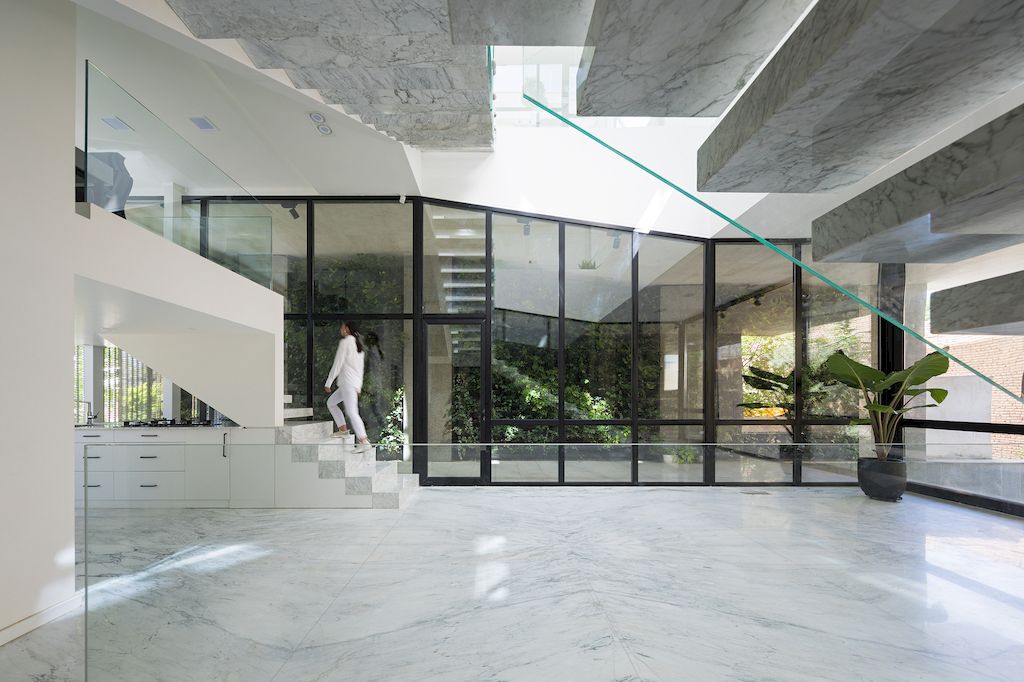 Outside-in House with Harmonious Space Connection by MA Office