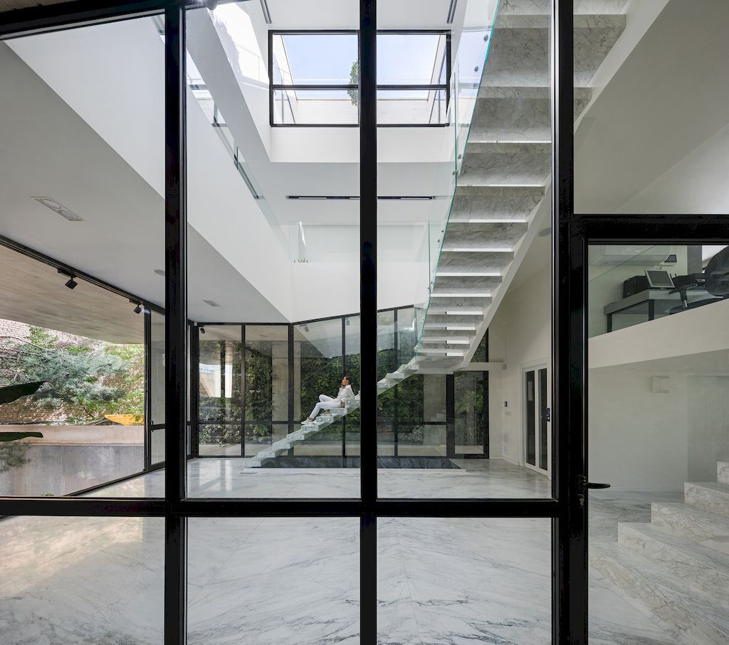 Outside-in House with Harmonious Space Connection by MA Office