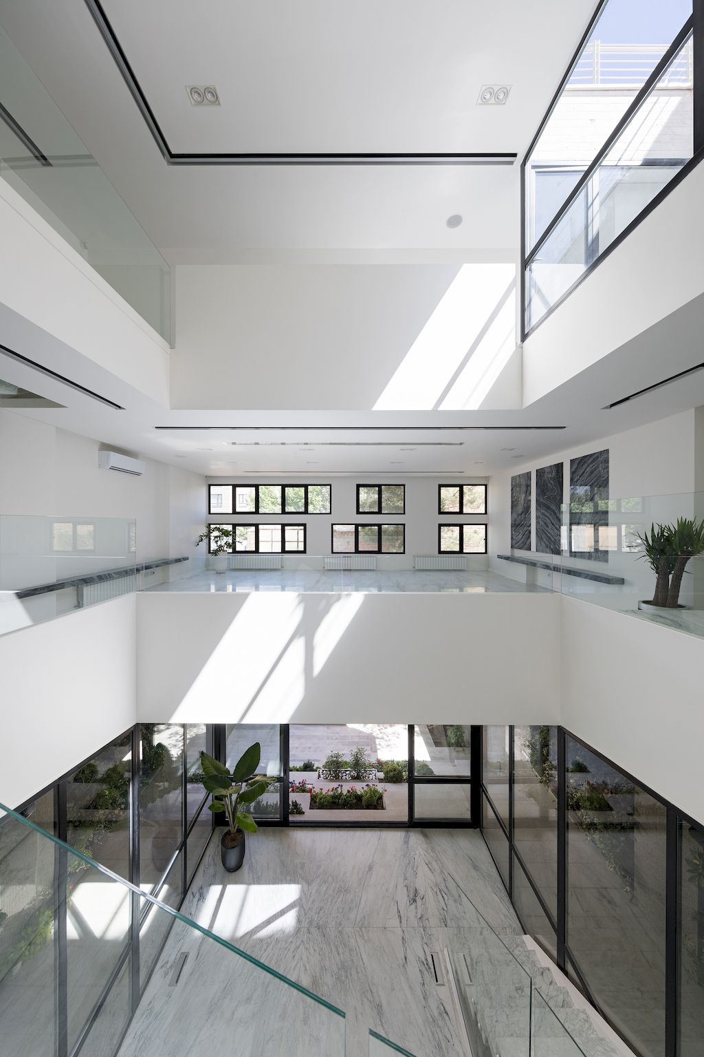 Outside-in House with Harmonious Space Connection by MA Office